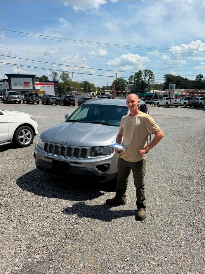 Kurt with his Jeep Compass purchased from TMT Motors